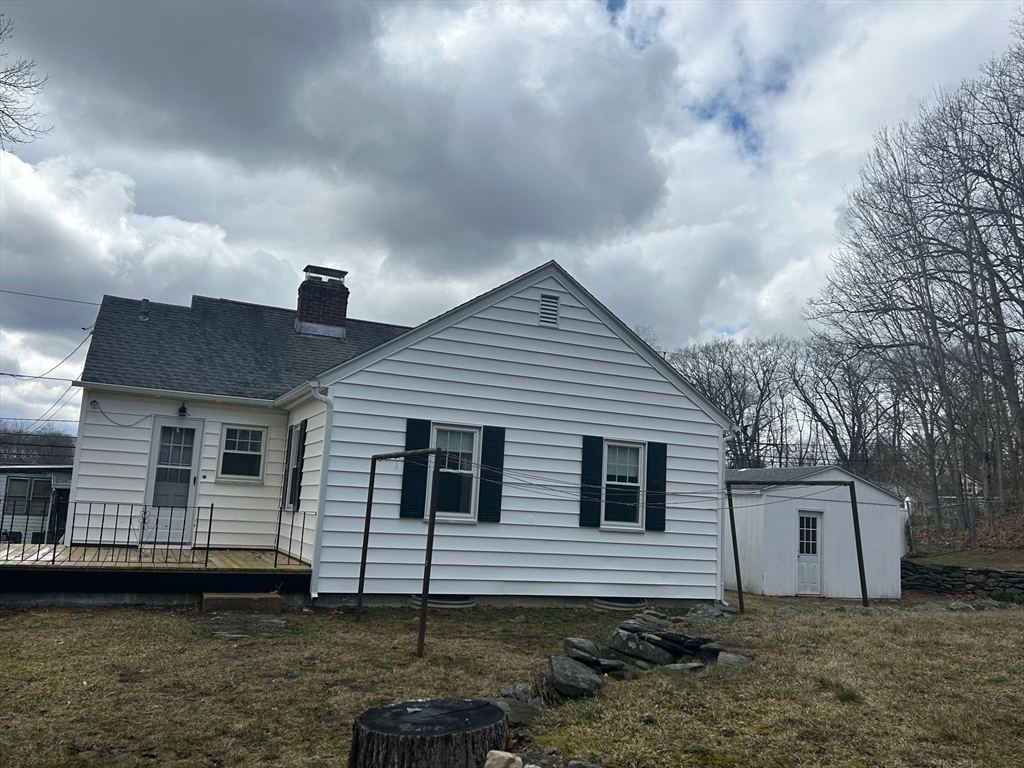 73 Sand Street Gardner, MA 01440 - Photo 6 of 23 a view of a house with a yard