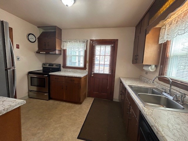 73 Sand Street Gardner, MA 01440 - Photo 9 of 23 a kitchen with granite countertop a sink stove and refrigerator