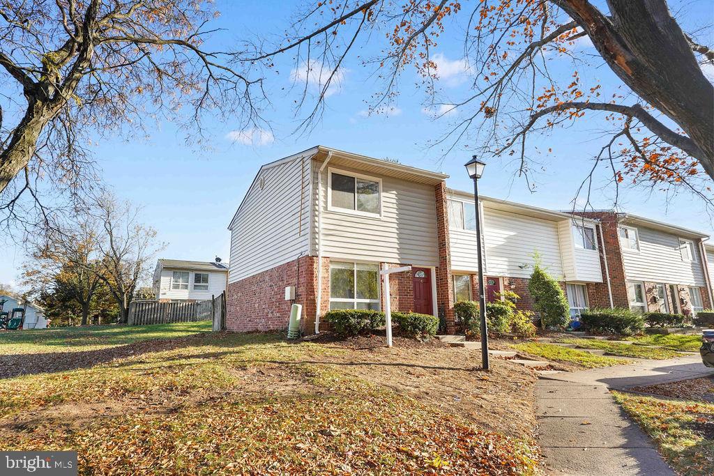 2201 Chamblee Place Herndon, VA 20170 - Photo 1 of 31 a front view of a house with a yard