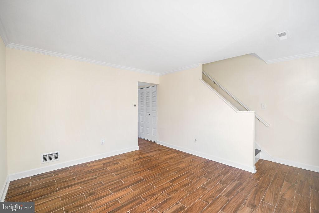 2201 Chamblee Place Herndon, VA 20170 - Photo 12 of 31 an empty room with wooden floor
