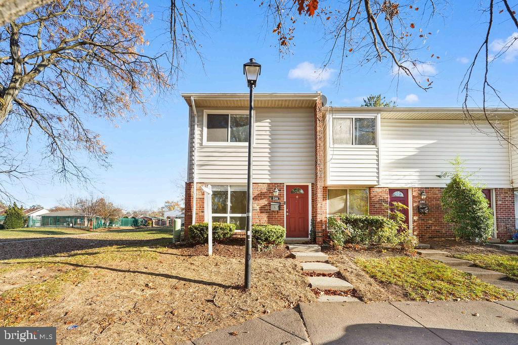 2201 Chamblee Place Herndon, VA 20170 - Photo 3 of 31 a view of a house with a yard