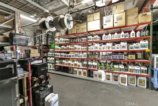 a view of path along with retail shop and buildings