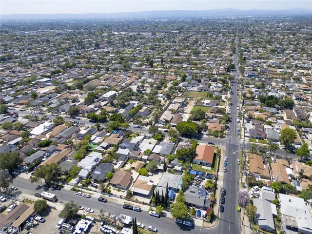 a view of a patio with table and chairs