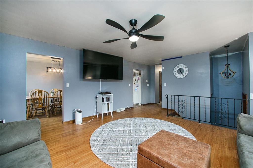 512 Leckrone-Highhouse Road McClellandtown, PA 15458 - Photo 11 of 34 a living room with furniture and a flat screen tv
