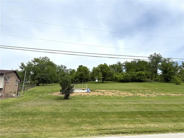 a view of a lake with a big yard