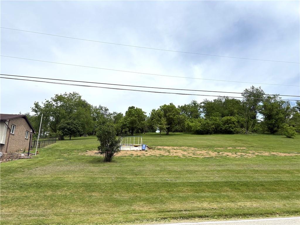 512 Leckrone-Highhouse Road McClellandtown, PA 15458 - Photo 7 of 34 a view of a lake with a big yard