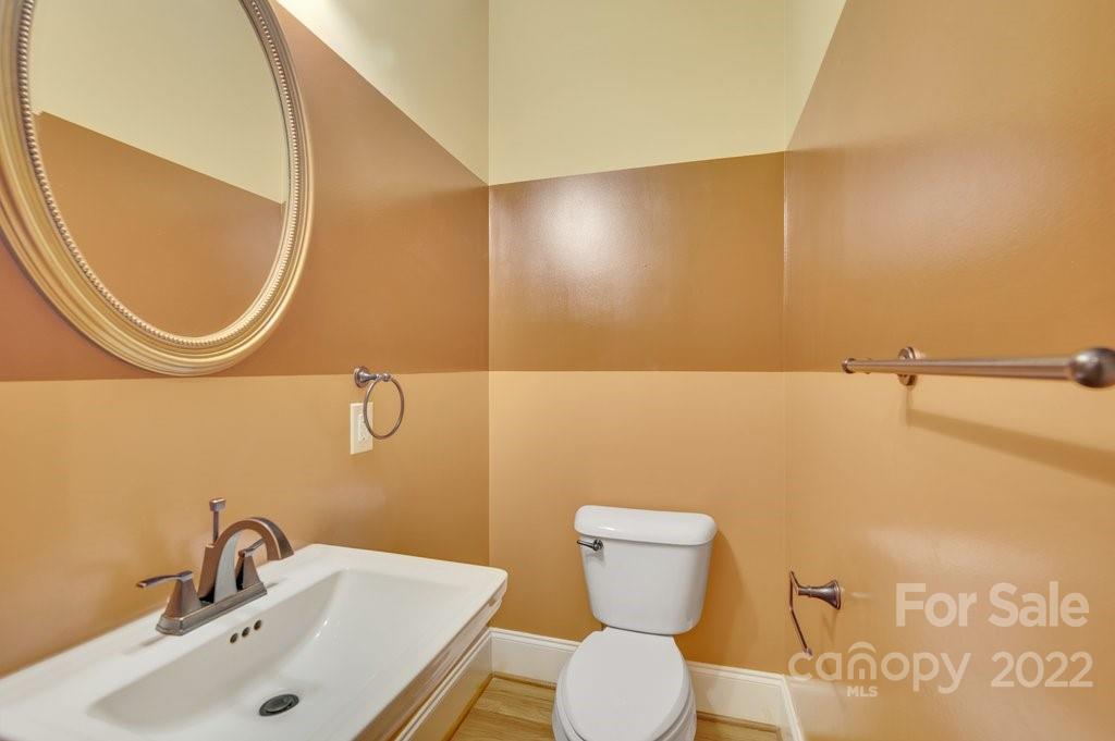 656 Amberly Crossing Fort Mill, SC 29708 - Photo 14 of 44 a bathroom with a toilet and a sink