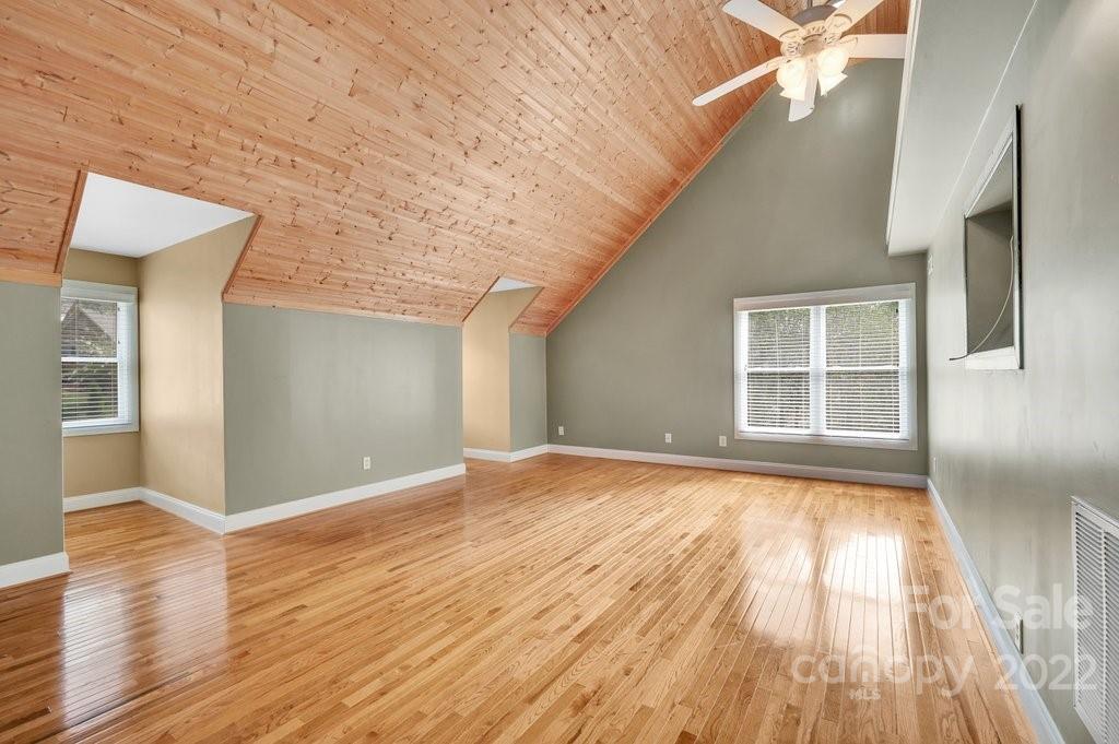 656 Amberly Crossing Fort Mill, SC 29708 - Photo 24 of 44 a view of empty room with wooden floor and fan
