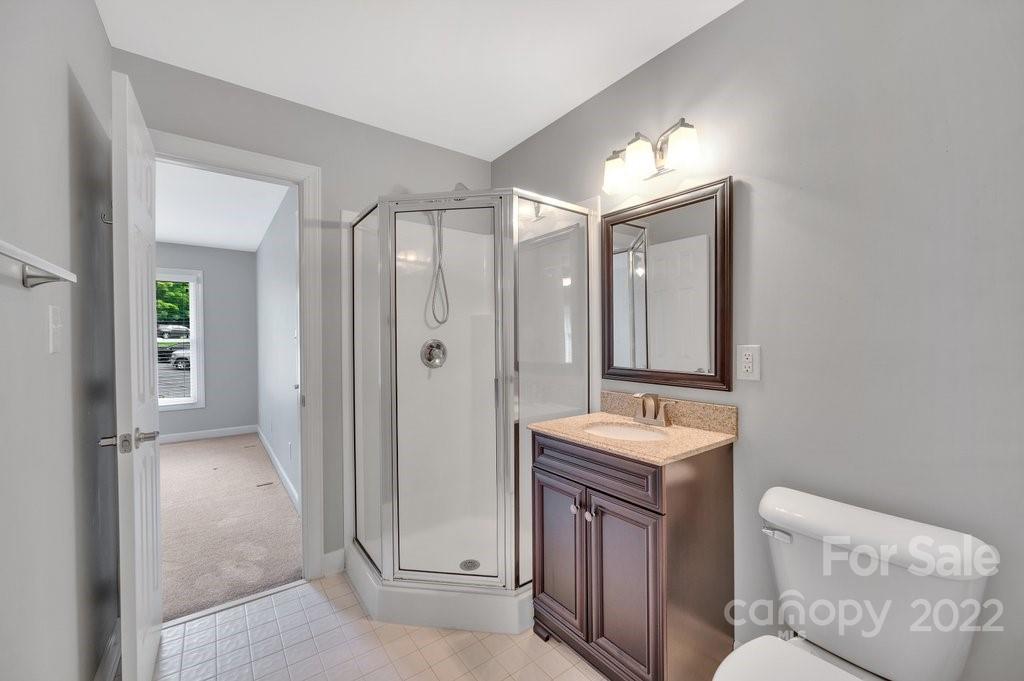 656 Amberly Crossing Fort Mill, SC 29708 - Photo 27 of 44 a bathroom with a sink and a mirror