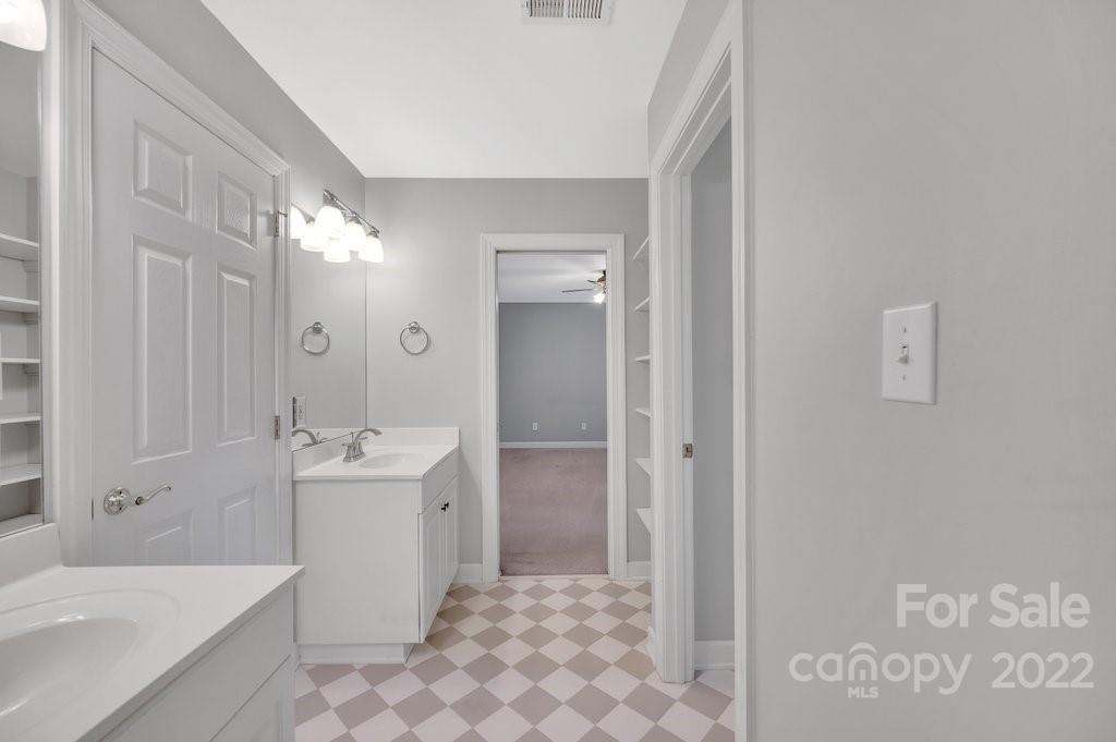 656 Amberly Crossing Fort Mill, SC 29708 - Photo 30 of 44 a bathroom with a sink a toilet and shower