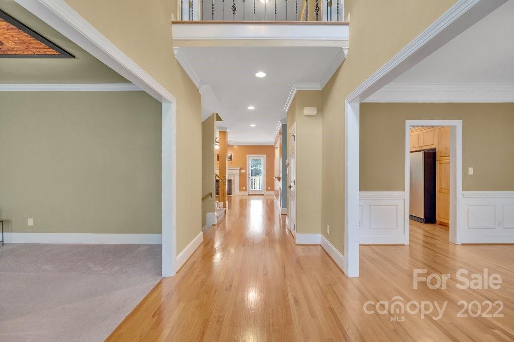 656 Amberly Crossing Fort Mill, SC 29708 - Photo 4 of 44 a view of a hallway with wooden floor