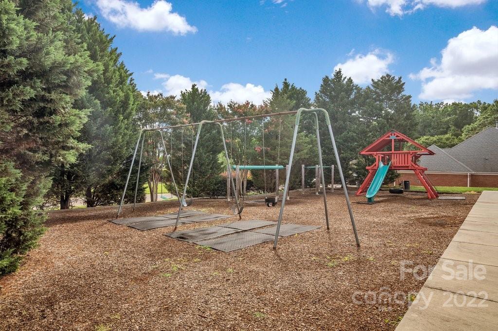 656 Amberly Crossing Fort Mill, SC 29708 - Photo 44 of 44 a view of outdoor space with playground and green space