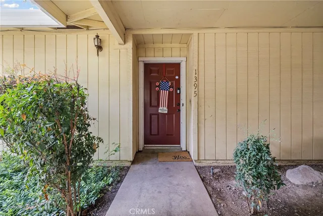 a view of a entryway with flower plants