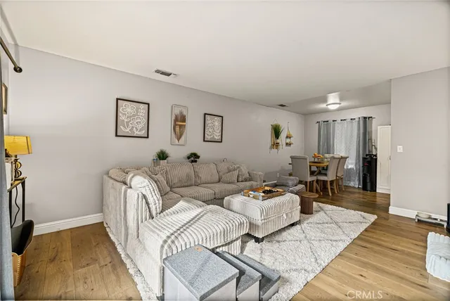 a kitchen with stainless steel appliances granite countertop a refrigerator stove and sink
