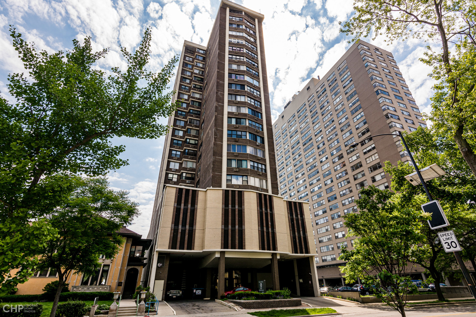 6325 North Sheridan Road, Unit 1508 Chicago, IL 60660 - Photo 1 of 16 a view of a tall building next to a road