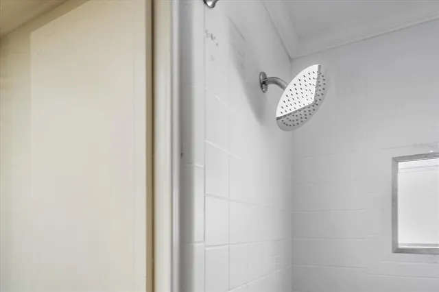 a bedroom with a bed and a closet