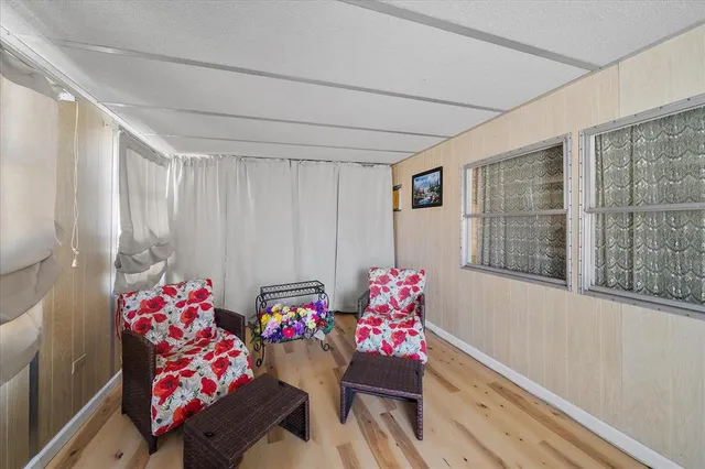 a workspace with furniture and window