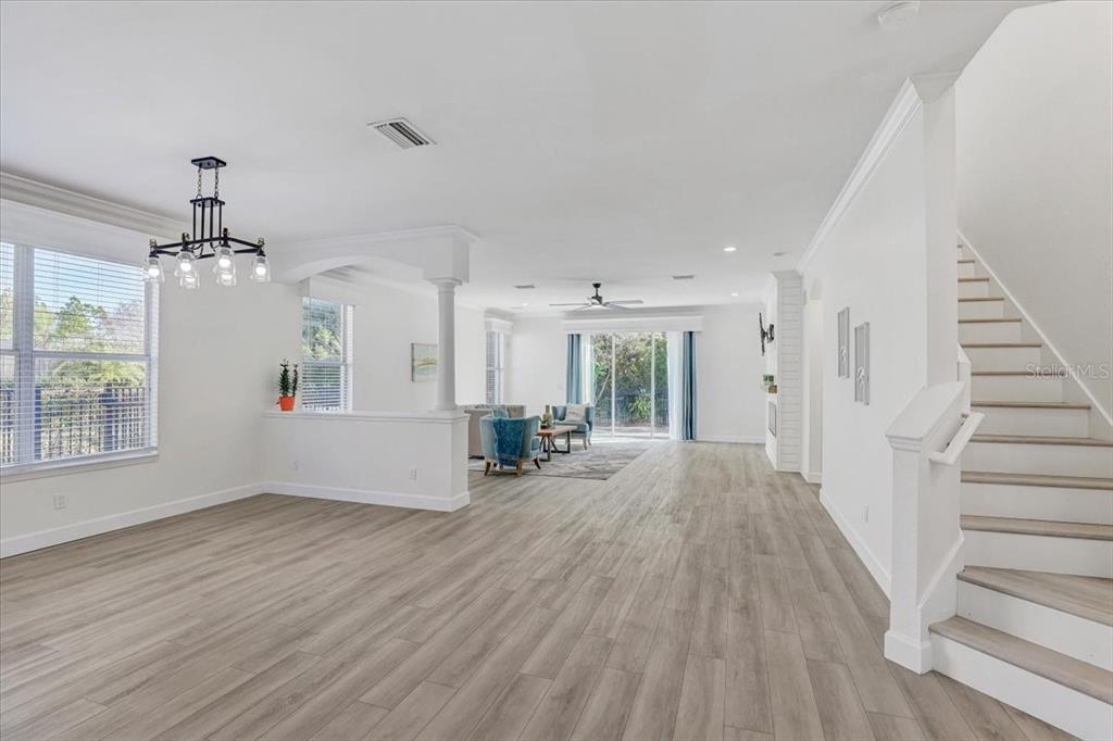 4006 91st Avenue East Parrish, FL 34219 - Photo 15 of 48 wooden floor in an empty room with a window