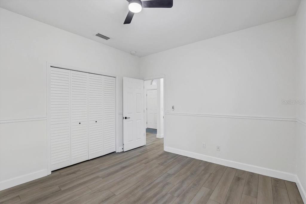 4006 91st Avenue East Parrish, FL 34219 - Photo 28 of 48 wooden floor in an empty room