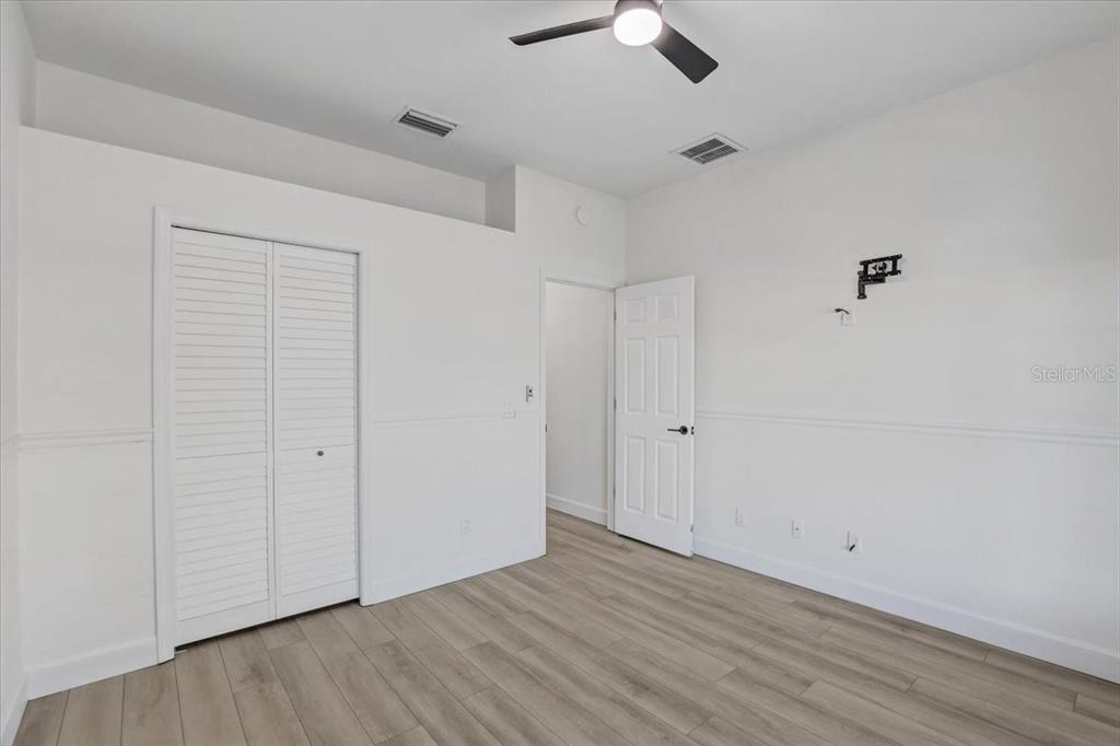 4006 91st Avenue East Parrish, FL 34219 - Photo 29 of 48 wooden floor in an empty room