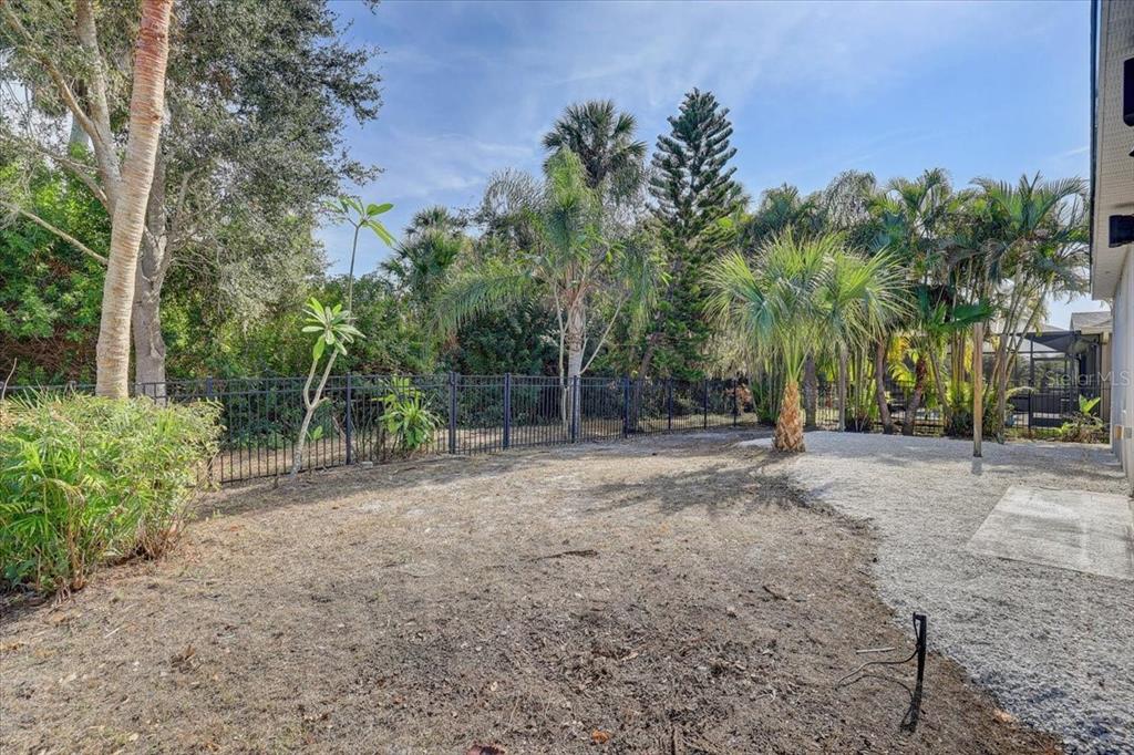4006 91st Avenue East Parrish, FL 34219 - Photo 48 of 48 a view of a field with trees in front of it