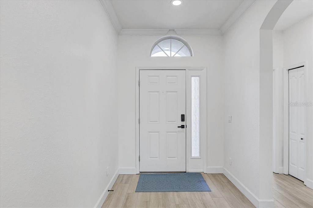 4006 91st Avenue East Parrish, FL 34219 - Photo 7 of 48 a view of empty room with wooden floor