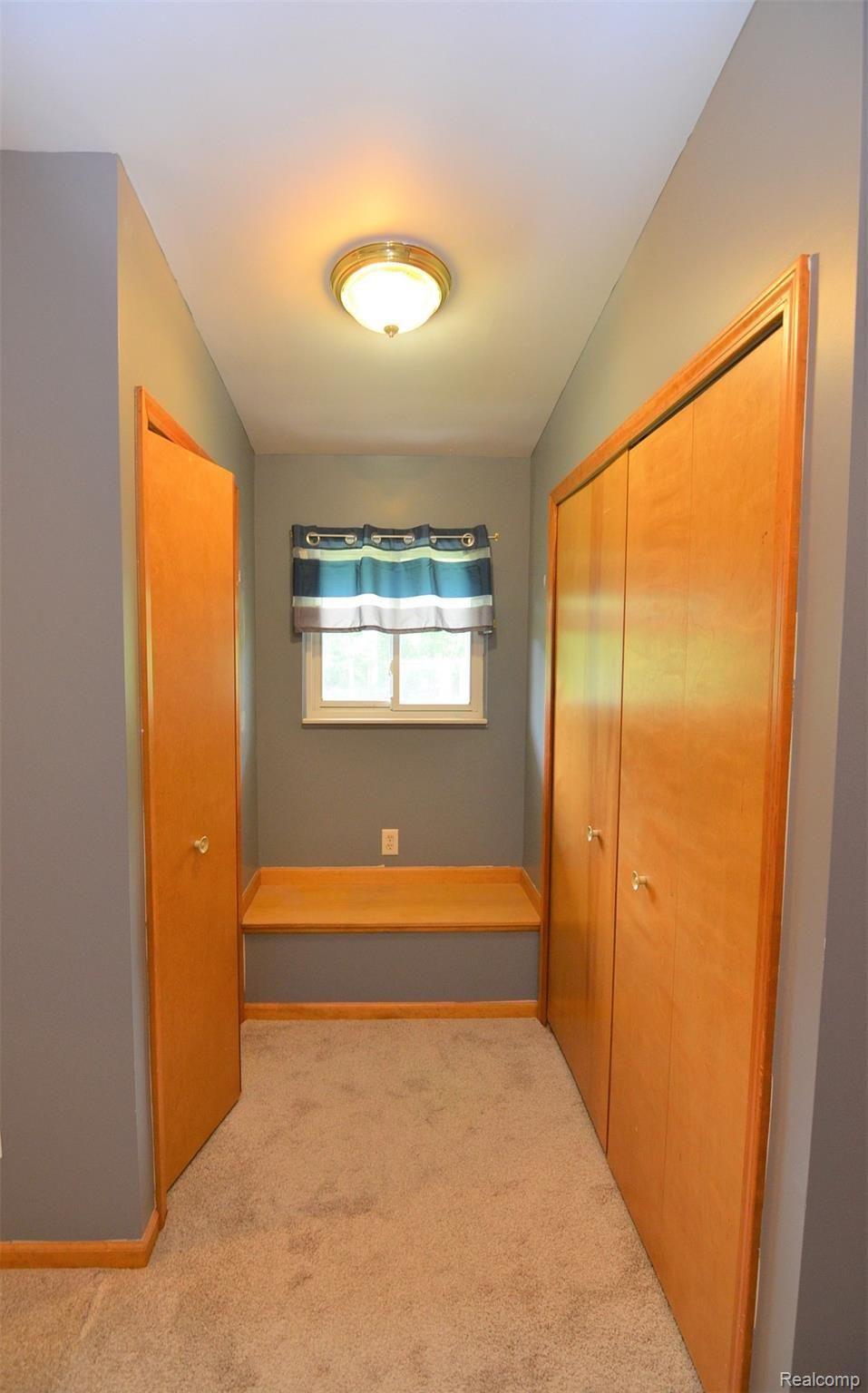 8388 Buckell Lake Road Holly, MI 48442 - Photo 13 of 22 SEPARATE MASTER CLOSETS~HANDY SEATING