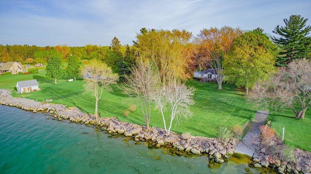 4551 East Lake Road Wilson, NY 14172 - Photo 1 of 1 200' of Lake Frontage with shoreline protection.