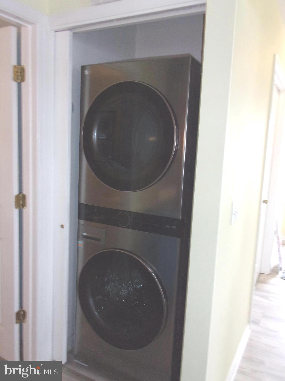 30397 Pavilion Drive, Unit 105 Ocean View, DE 19970 - Photo 20 of 34 New stacked washer/dryer