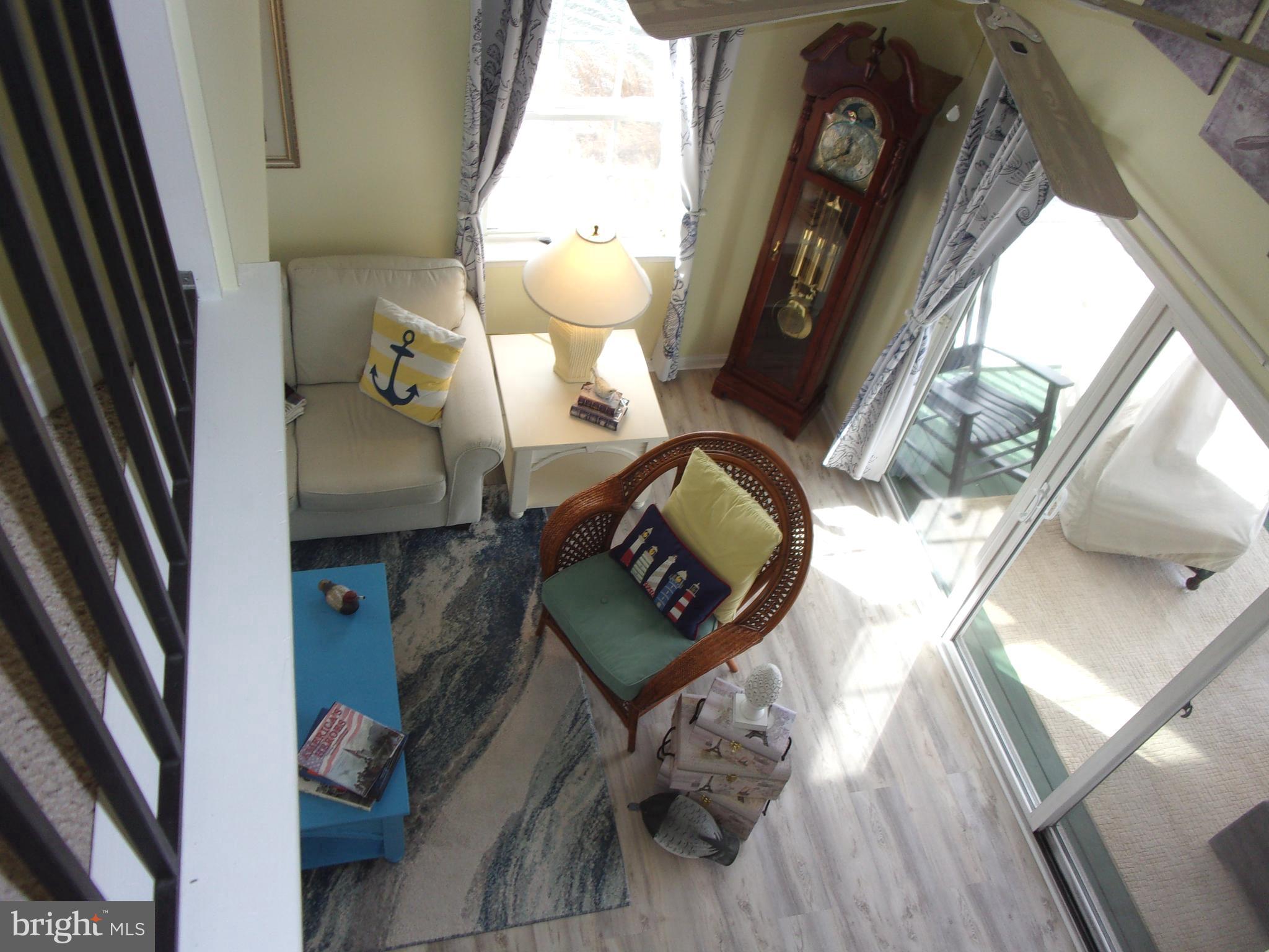 30397 Pavilion Drive, Unit 105 Ocean View, DE 19970 - Photo 22 of 34 Living room from upstairs balcony