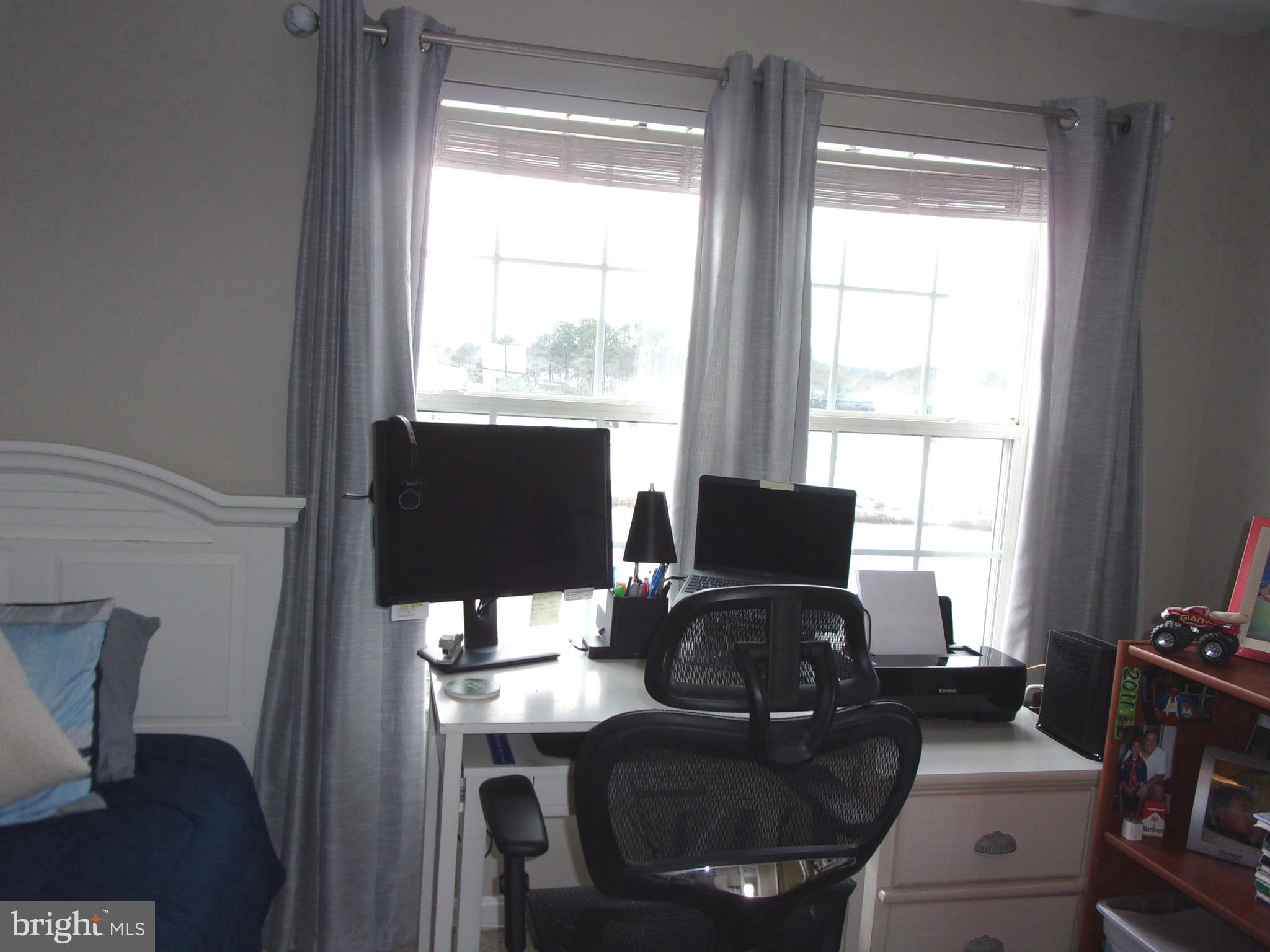 30397 Pavilion Drive, Unit 105 Ocean View, DE 19970 - Photo 24 of 34 Office area overlooking pond