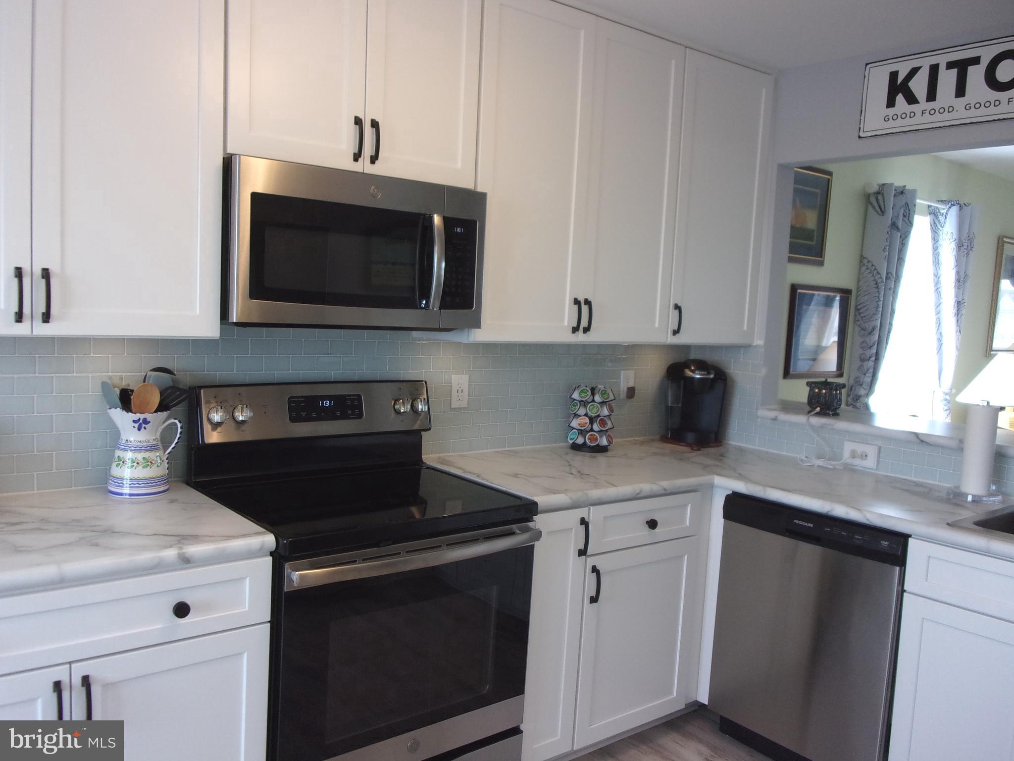 30397 Pavilion Drive, Unit 105 Ocean View, DE 19970 - Photo 9 of 34 Newly remodeled kitchen