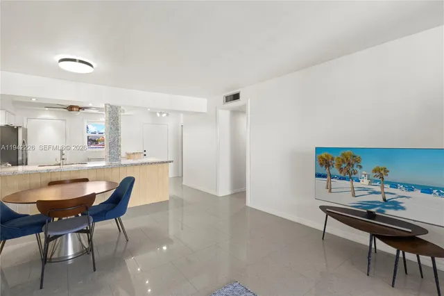 a living room with furniture and a table