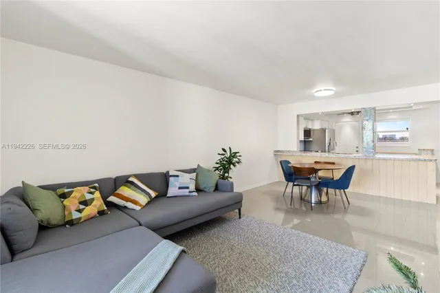 a living room with furniture and a couch