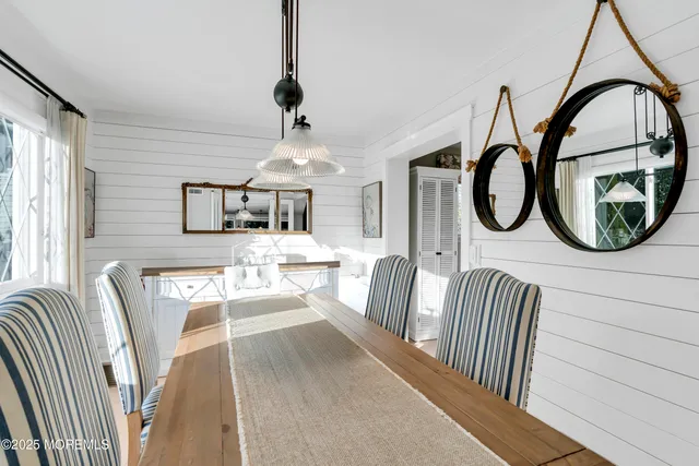 a view of a livingroom with furniture and window