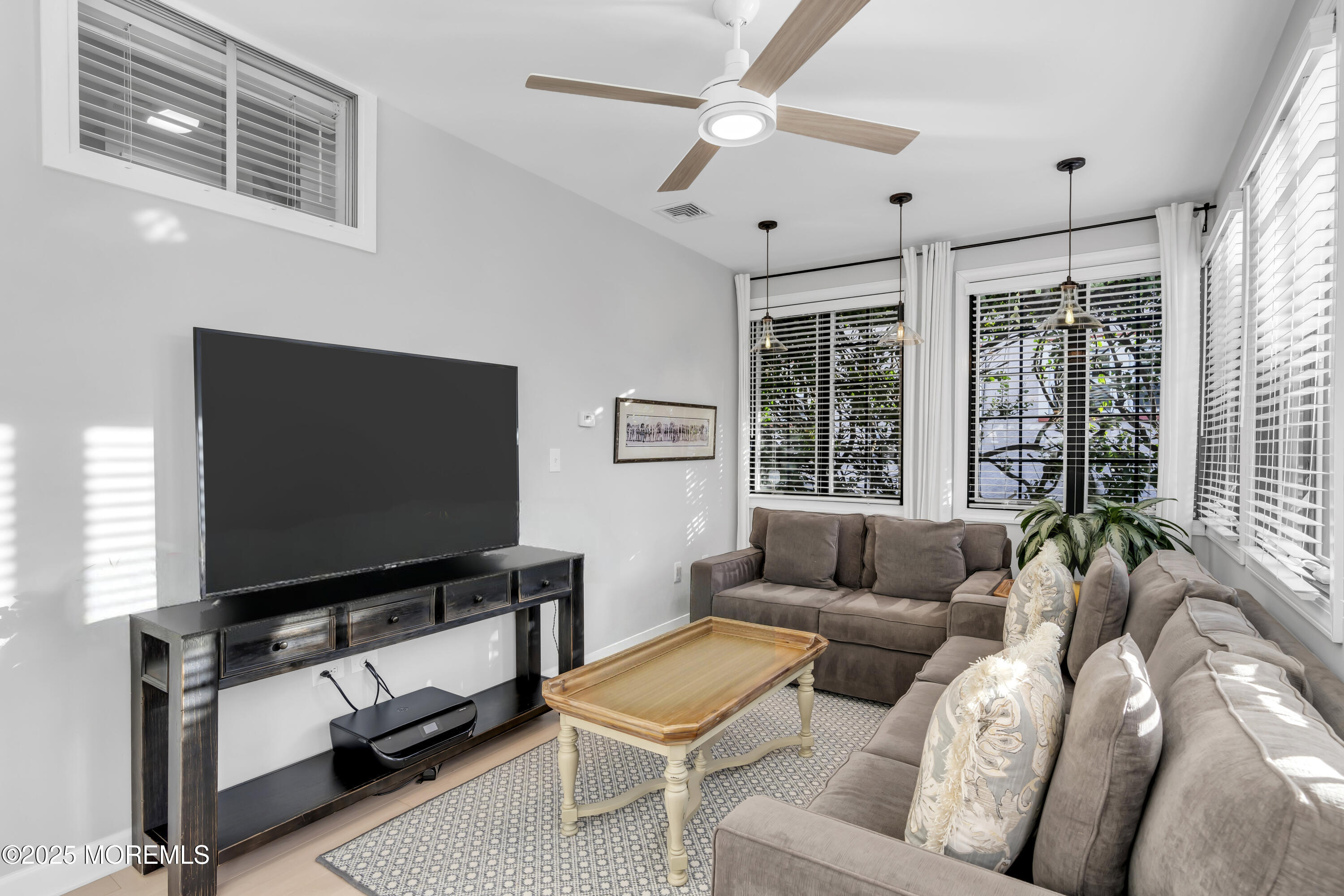 2123 Edgewood Place Spring Lake, NJ 07762 - Photo 7 of 21 a living room with furniture and a flat screen tv