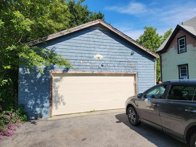 a house view with a backyard space