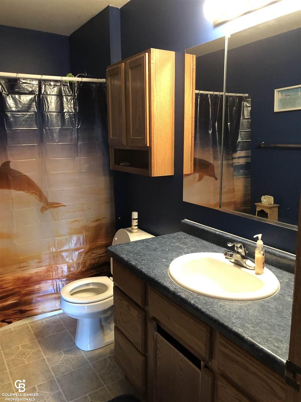 1103 East Galbraith Line Road Melvin, MI 48454 - Photo 20 of 43 View of bathroom in hallway