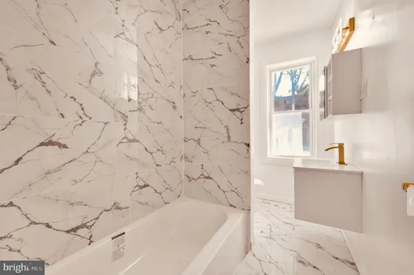 view of a bathroom with mirror