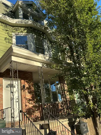 a side view of a house with a window