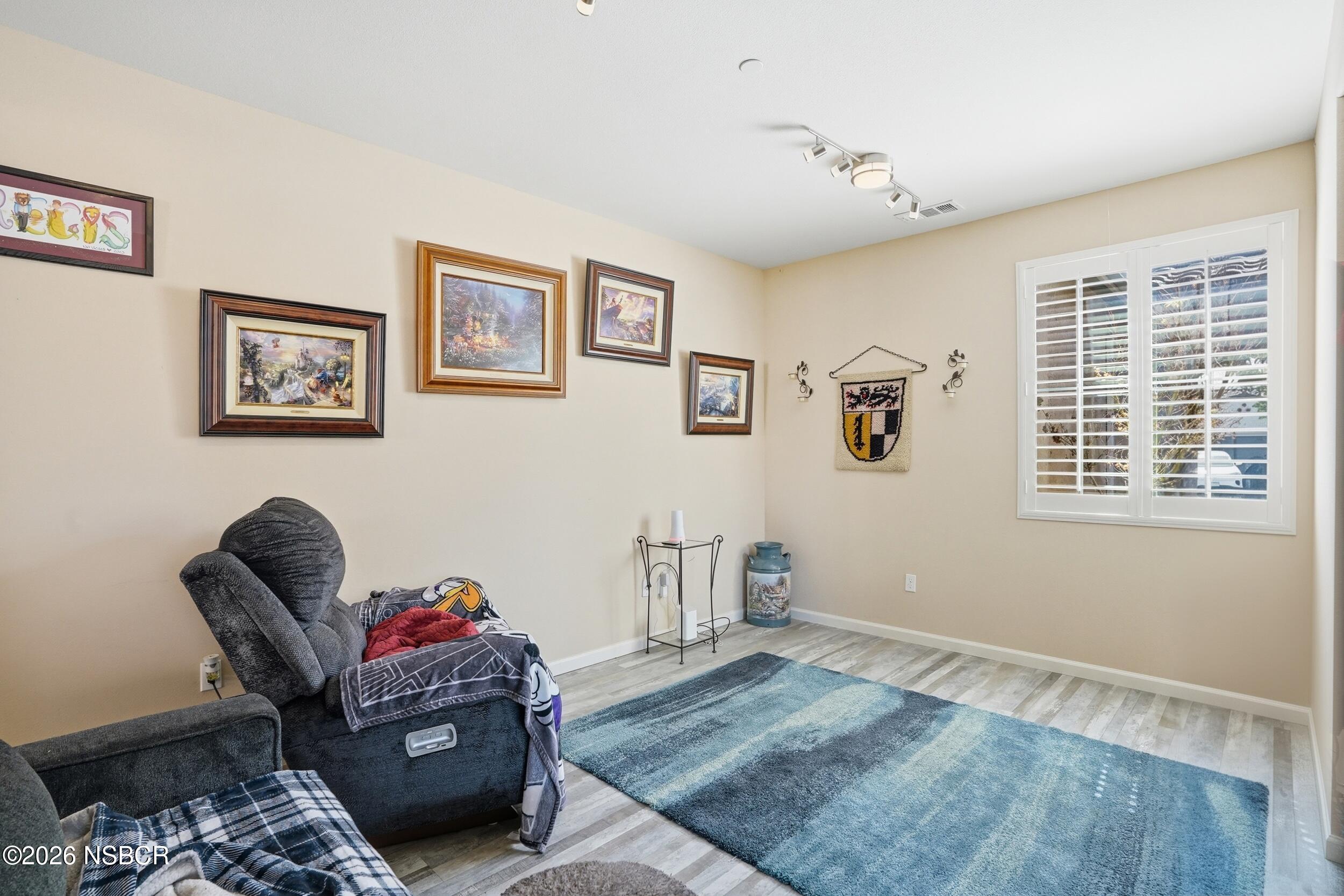 2205 Point Sal Loop Lompoc, CA 93436 - Photo 17 of 36 a living room with furniture and a window