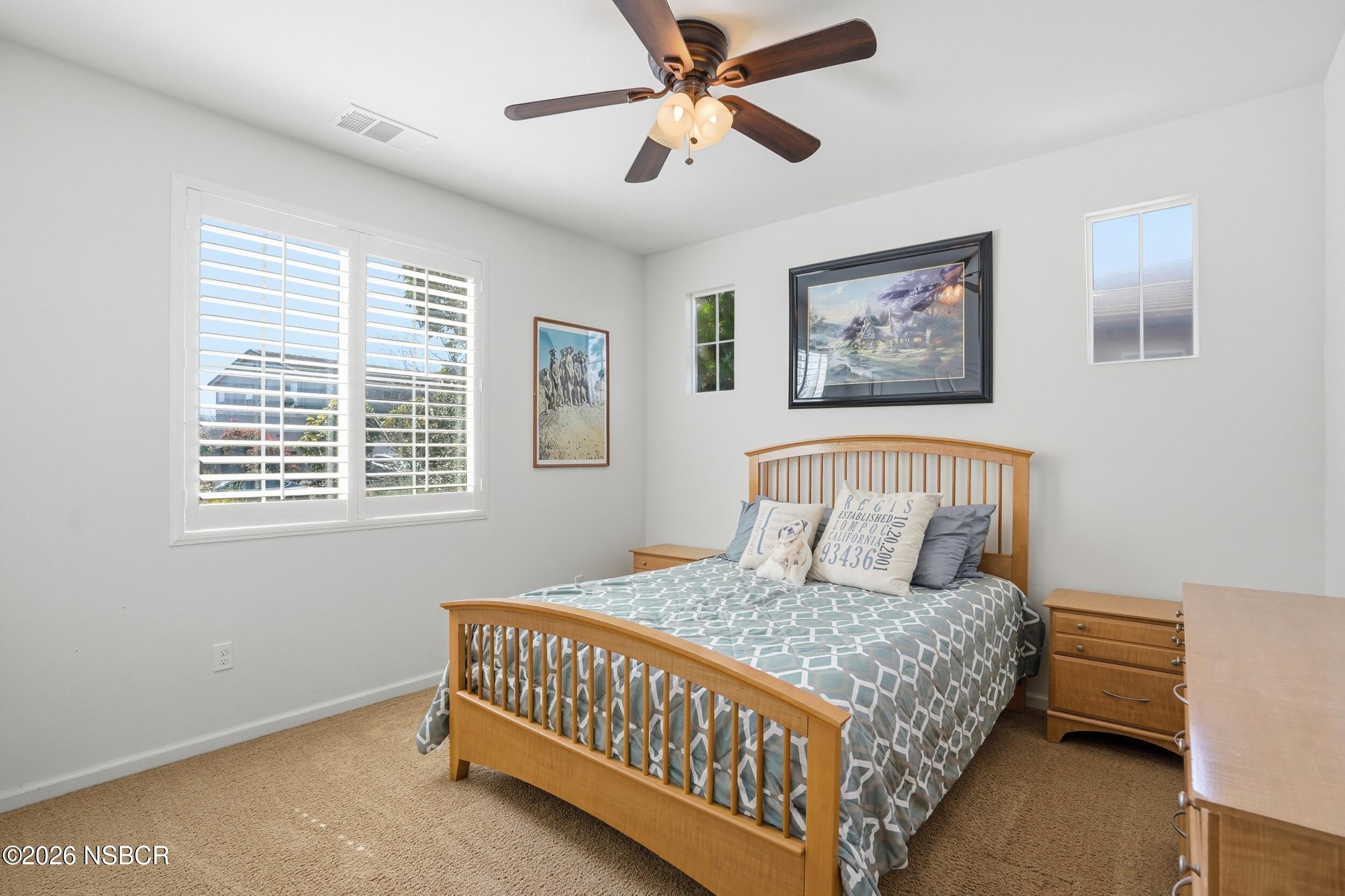 2205 Point Sal Loop Lompoc, CA 93436 - Photo 20 of 36 a bedroom with a bed and a window