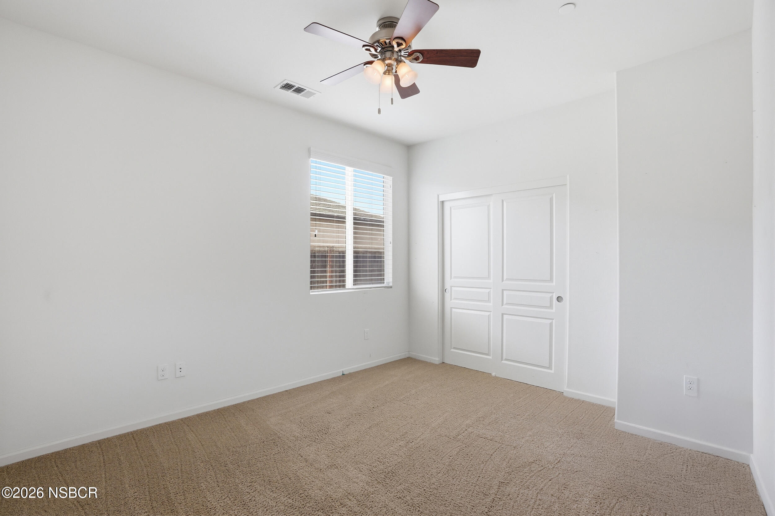 2205 Point Sal Loop Lompoc, CA 93436 - Photo 22 of 36 an empty room with windows and fan