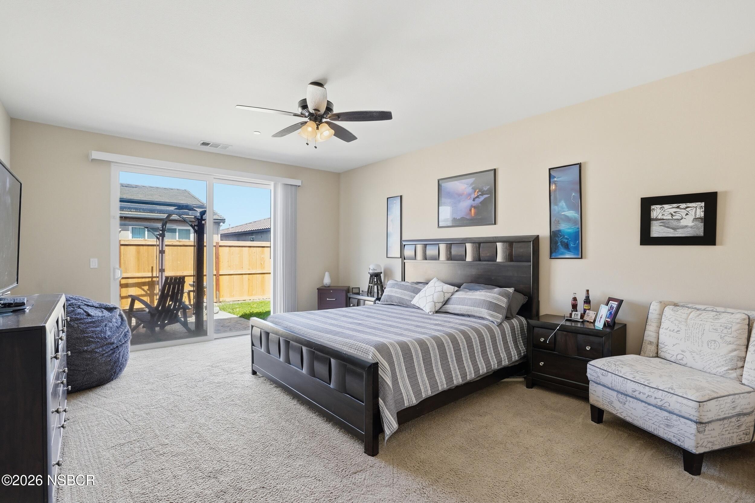 2205 Point Sal Loop Lompoc, CA 93436 - Photo 24 of 36 a bedroom with a bed couch and window