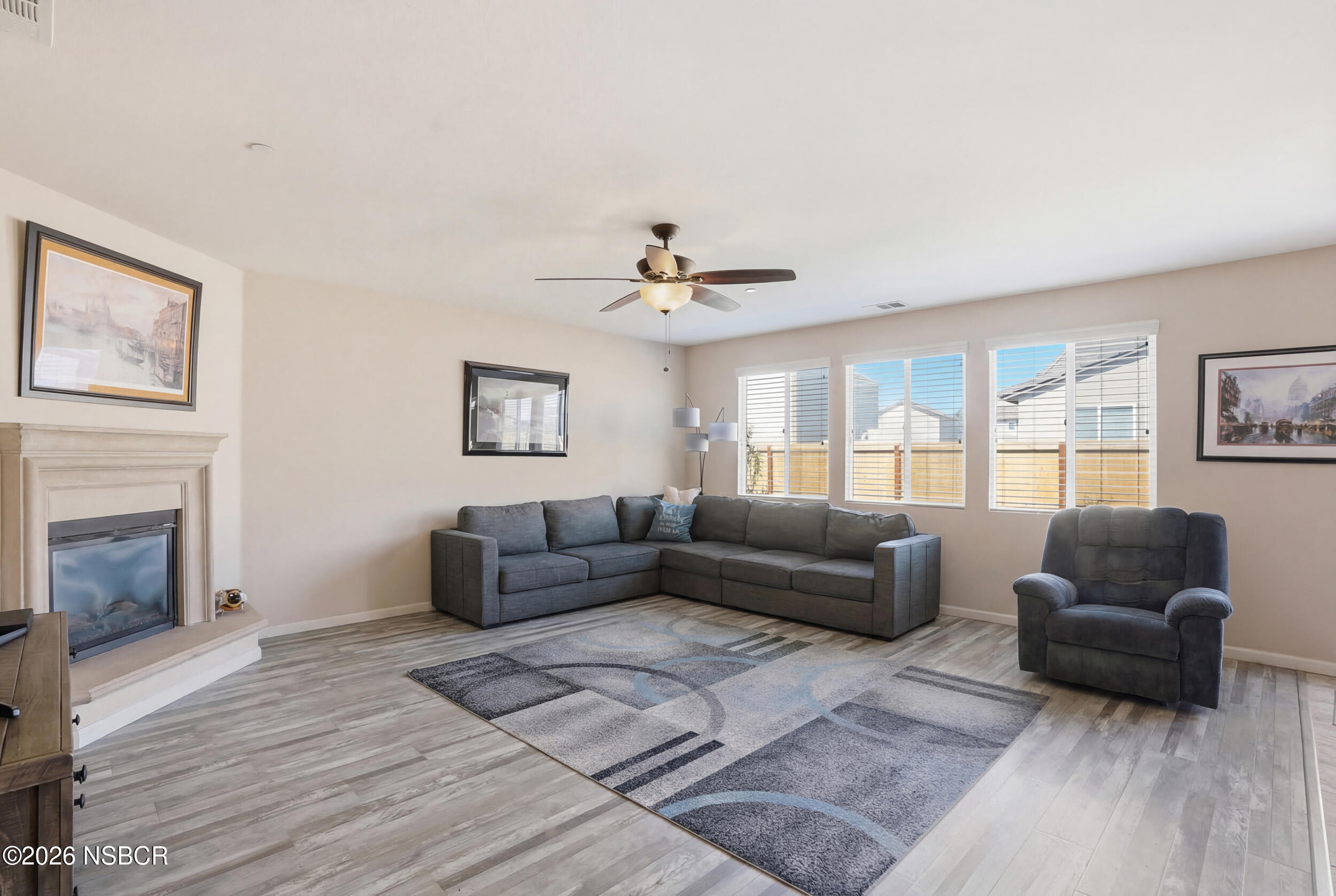 2205 Point Sal Loop Lompoc, CA 93436 - Photo 4 of 36 a living room with furniture and a fireplace