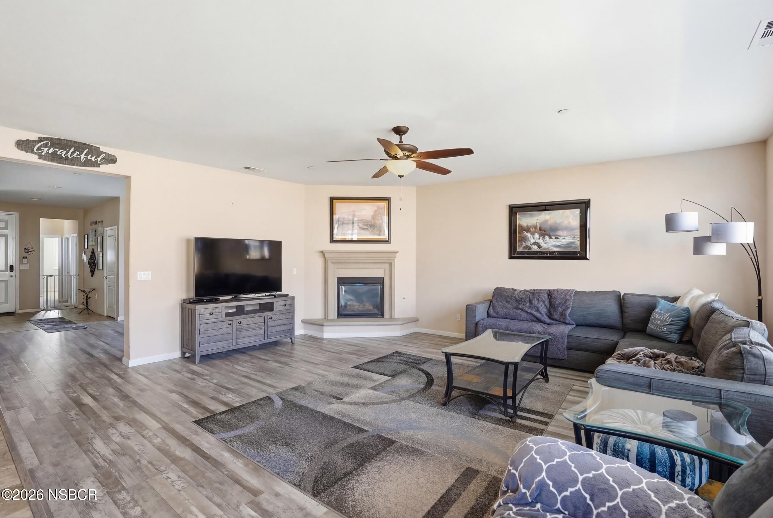 2205 Point Sal Loop Lompoc, CA 93436 - Photo 5 of 36 a living room with furniture and a flat screen tv