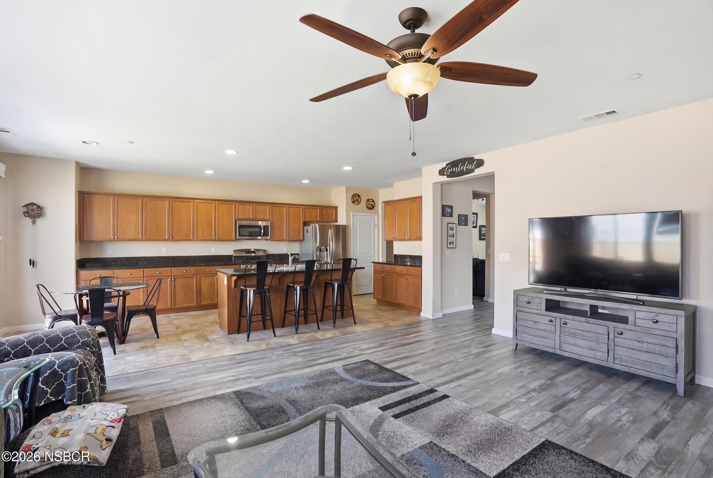 2205 Point Sal Loop Lompoc, CA 93436 - Photo 8 of 36 a living room with furniture and a flat screen tv