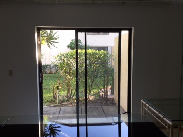 21676 Cypress Road, Unit 12C Boca Raton, FL 33433 - Photo 6 of 8 SLIDER OF DINING ROOM