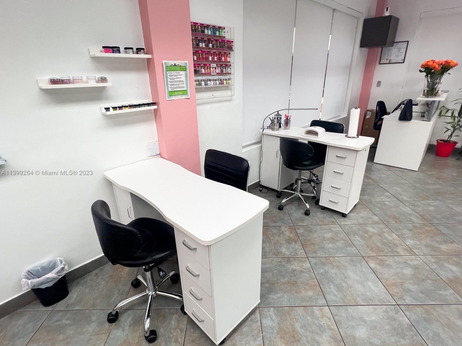 10675 Southwest 88th Street Kendall, FL 33176 - Photo 7 of 17 a view of a workspace with furniture
