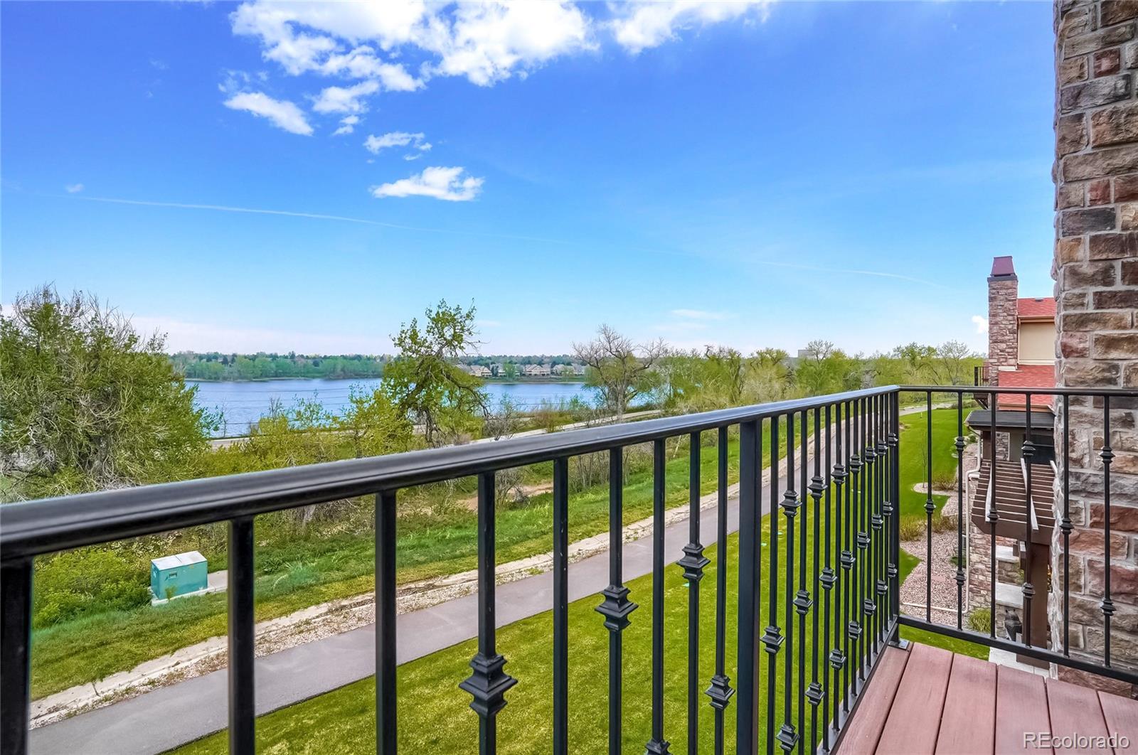 2363 Primo Road, Unit E Highlands Ranch, CO 80129 - Photo 18 of 36 a view of a balcony with an outdoor space